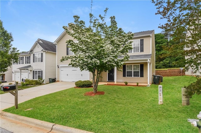 view of front of property with a front lawn and a garage