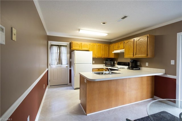 kitchen with white appliances, ornamental molding, a sink, a peninsula, and light countertops