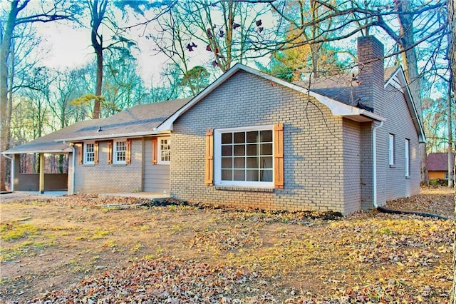 single story home featuring a patio