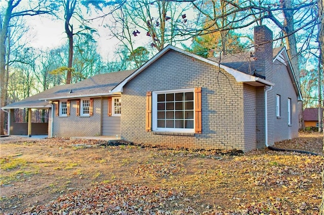 view of front of home with a patio area