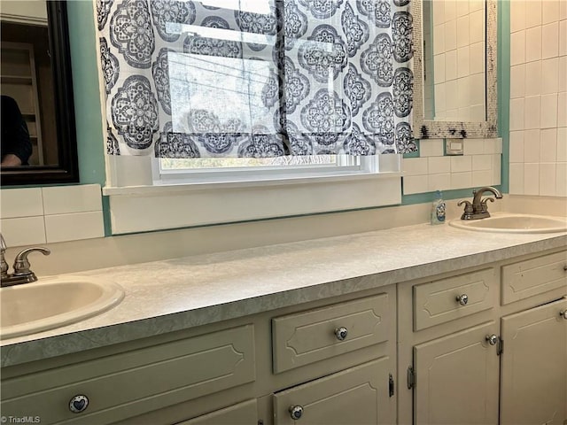 bathroom with vanity and backsplash