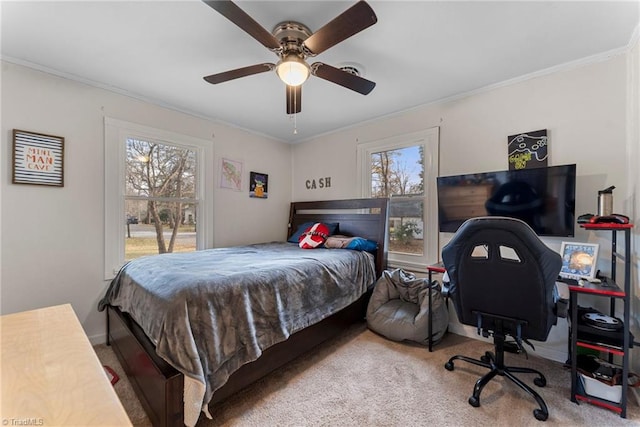 bedroom featuring carpet floors, multiple windows, and ceiling fan