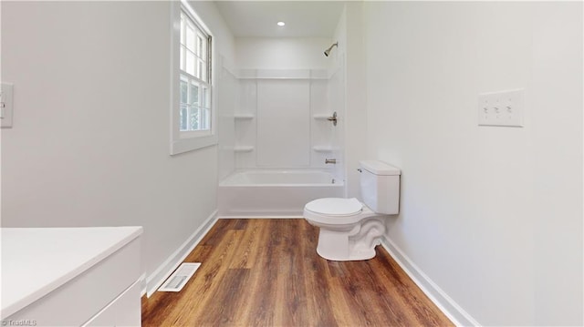 1023 Spring St, Mount Airy, NC 27030 - full bathroom with wood finished floors, bathtub / shower combination, and vanity