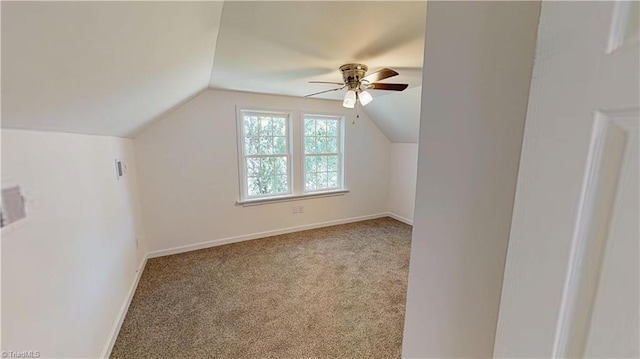 1023 Spring St, Mount Airy, NC 27030 - additional living space with a ceiling fan, carpet, and vaulted ceiling