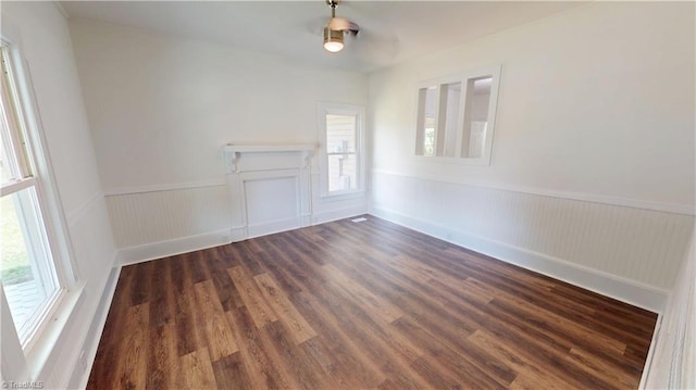 1023 Spring St, Mount Airy, NC 27030 - unfurnished room featuring a wainscoted wall and wood finished floors