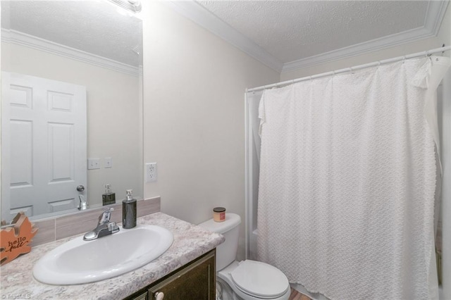 bathroom featuring crown molding, vanity, toilet, and a textured ceiling
