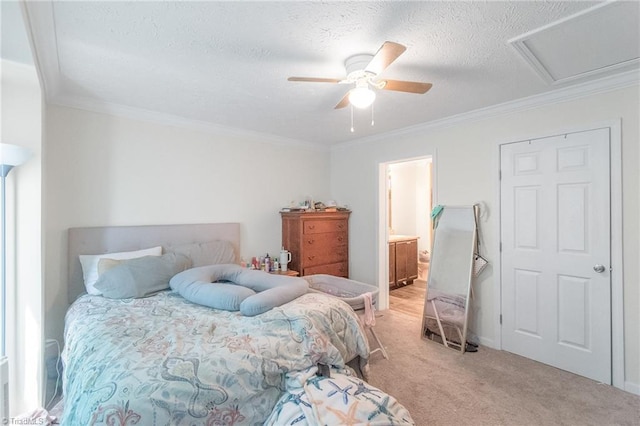 bedroom with ornamental molding, a textured ceiling, a ceiling fan, and light carpet