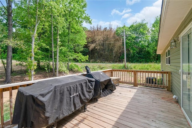 deck featuring a grill