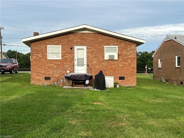 6327 Blazing Star Dr, Archdale, NC 27263 - back of house with brick siding, crawl space, and a yard