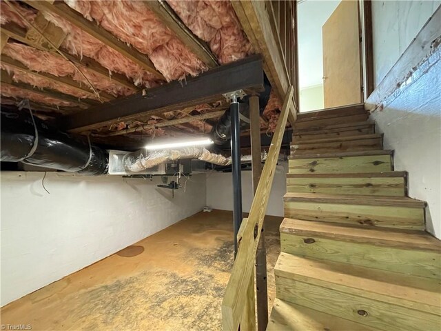 6327 Blazing Star Dr, Archdale, NC 27263 - stairs featuring unfinished concrete floors