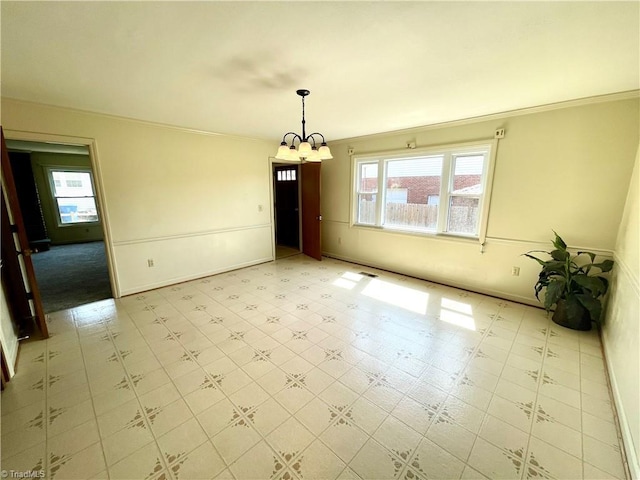 6327 Blazing Star Dr, Archdale, NC 27263 - unfurnished dining area with baseboards, ornamental molding, light floors, and an inviting chandelier