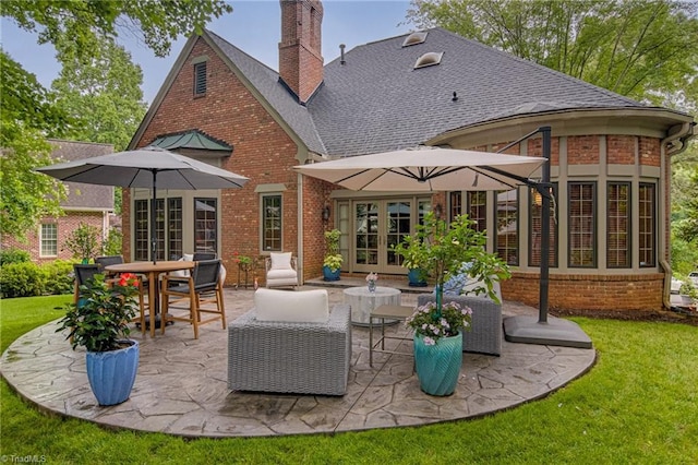 3705 Bradwyck Cir, Winston-Salem, NC 27104 - rear view of property featuring brick siding and a patio
