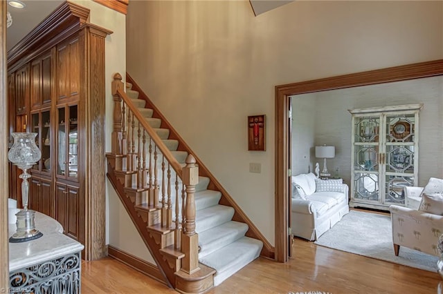 3705 Bradwyck Cir, Winston-Salem, NC 27104 - stairway featuring wood finished floors, baseboards, and plenty of natural light