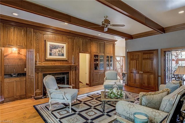3705 Bradwyck Cir, Winston-Salem, NC 27104 - living room featuring beam ceiling, light wood finished floors, a ceiling fan, a glass covered fireplace, and recessed lighting