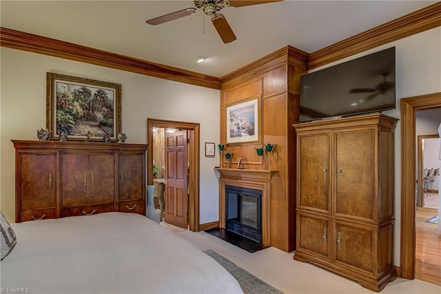 3705 Bradwyck Cir, Winston-Salem, NC 27104 - bedroom featuring a fireplace with flush hearth, ornamental molding, a ceiling fan, and baseboards