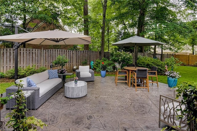 3705 Bradwyck Cir, Winston-Salem, NC 27104 - fenced backyard featuring a patio, an outdoor living space, and outdoor dining space