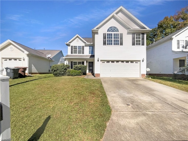 view of front property featuring a garage and a front lawn