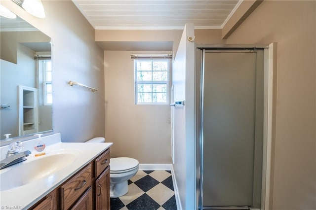 full bath with tile patterned floors, toilet, a stall shower, ornamental molding, and vanity