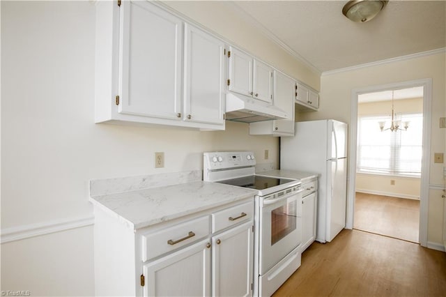 kitchen with ornamental molding, white appliances, white cabinets, and under cabinet range hood