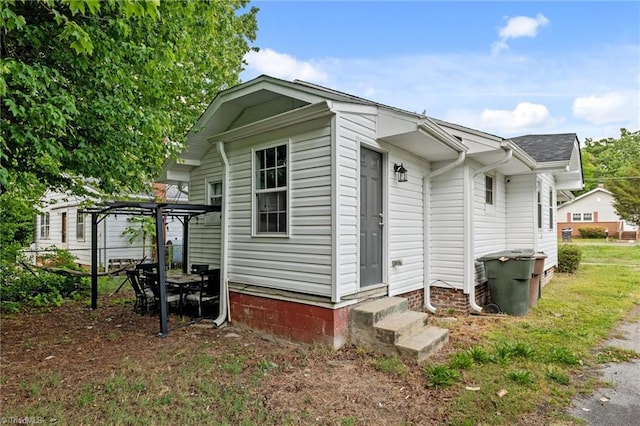 exterior space with a pergola and entry steps