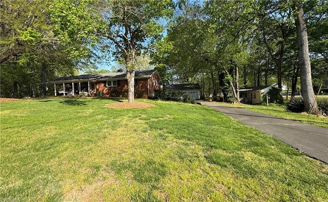 view of yard with a porch