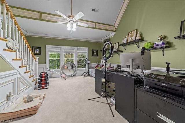 workout area featuring ornamental molding, carpet flooring, and ceiling fan