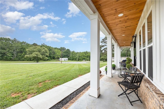 138 Arthur Needham Rd, Pilot Mountain, NC 27041 - covered porch featuring a lawn