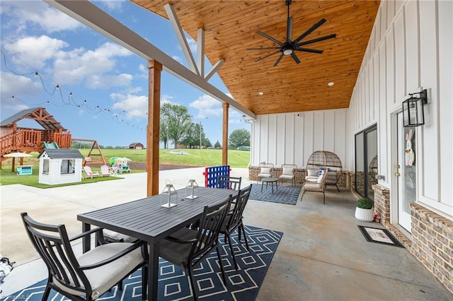 138 Arthur Needham Rd, Pilot Mountain, NC 27041 - view of patio featuring outdoor dining space, ceiling fan, a playground, and an outdoor living space