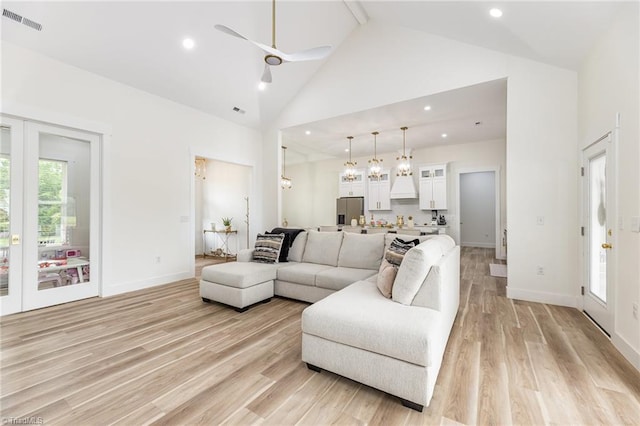 138 Arthur Needham Rd, Pilot Mountain, NC 27041 - living area with high vaulted ceiling, light wood-type flooring, a ceiling fan, recessed lighting, and baseboards