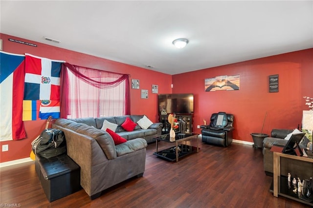 living room featuring dark hardwood / wood-style floors