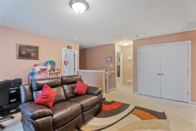 living room featuring light colored carpet