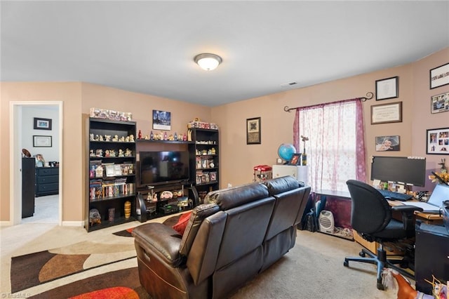 office area featuring light colored carpet