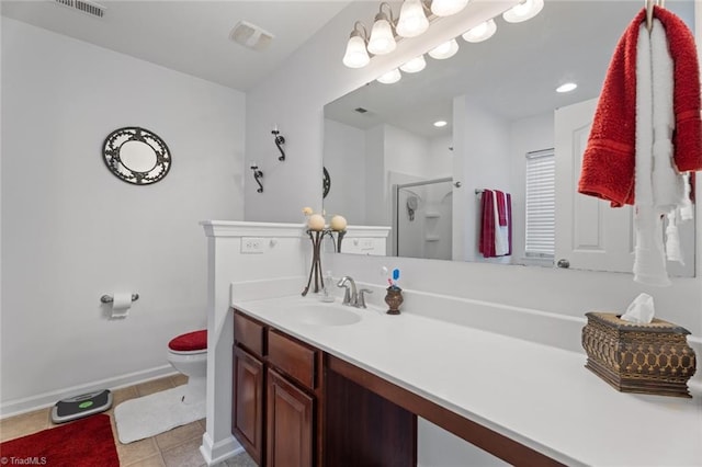 bathroom featuring vanity, an enclosed shower, tile patterned floors, and toilet