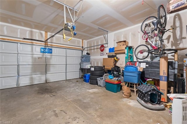 garage featuring a garage door opener