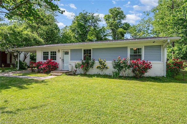 ranch-style house with a front lawn