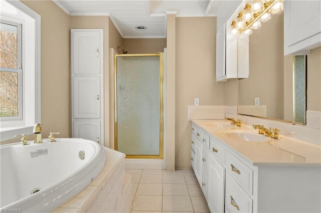 bathroom featuring tile patterned floors, vanity, ornamental molding, and shower with separate bathtub