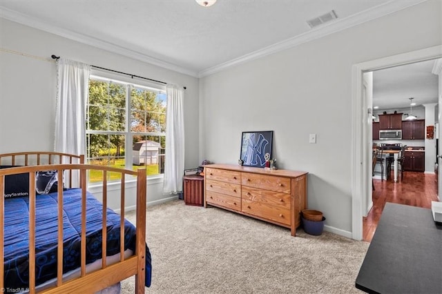 6770 Cotton Rd, Gibsonville, NC 27249 - carpeted bedroom with ornamental molding and baseboards