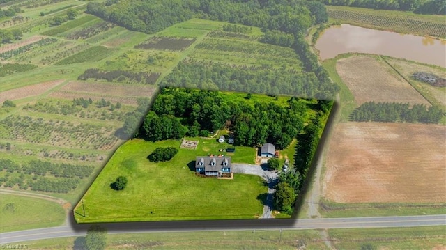 6770 Cotton Rd, Gibsonville, NC 27249 - overview of rural landscape with a nearby body of water and farmland