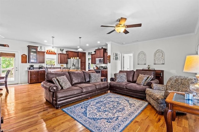 6770 Cotton Rd, Gibsonville, NC 27249 - living room with ceiling fan, ornamental molding, light wood-style floors, and recessed lighting