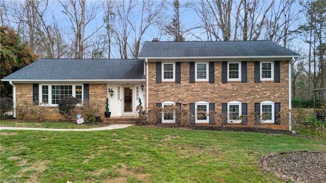 view of front facade with a front lawn