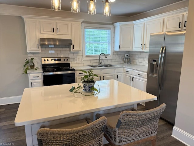 6472 S NC Highway 801 S, Mocksville, NC 27028 - kitchen with stainless steel appliances, wall chimney range hood, white cabinets, and dark wood-style floors