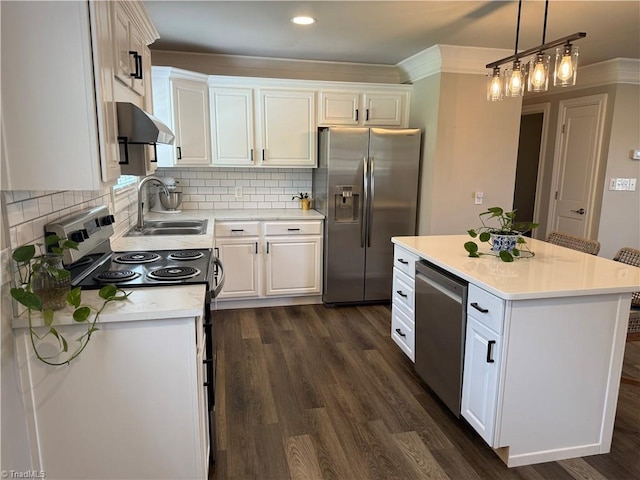 6472 S NC Highway 801 S, Mocksville, NC 27028 - kitchen featuring stainless steel appliances, under cabinet range hood, white cabinets, light countertops, and dark wood-type flooring