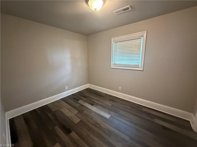 6472 S NC Highway 801 S, Mocksville, NC 27028 - empty room with baseboards and dark wood finished floors