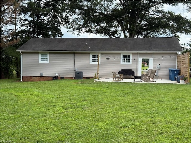 6472 S NC Highway 801 S, Mocksville, NC 27028 - back of property featuring a patio, a lawn, and crawl space