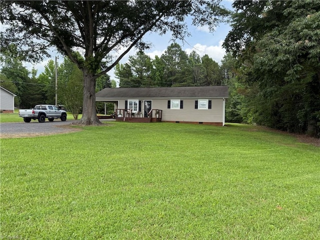 6472 S NC Highway 801 S, Mocksville, NC 27028 - view of front facade featuring crawl space, a front lawn, driveway, and a wooden deck