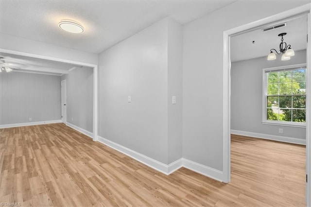 4 Manard Ct, Greensboro, NC 27407 - unfurnished room with light wood-type flooring, baseboards, and a ceiling fan