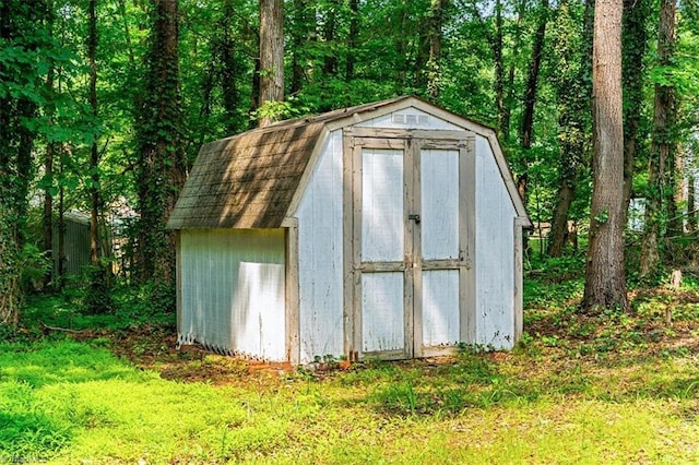4 Manard Ct, Greensboro, NC 27407 - view of shed with a wooded view