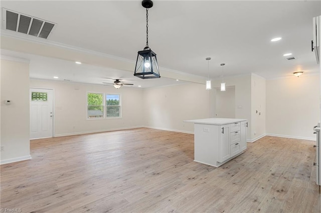 interior space with light wood-style flooring, visible vents, recessed lighting, decorative light fixtures, and a ceiling fan