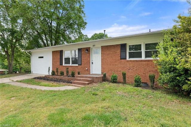 ranch-style home with a front lawn and brick siding