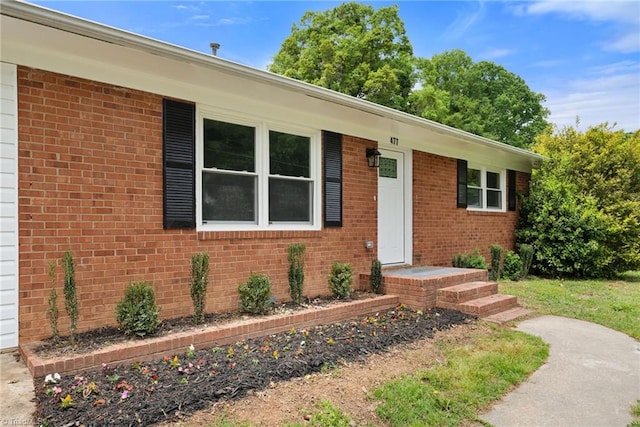 view of front of property with brick siding